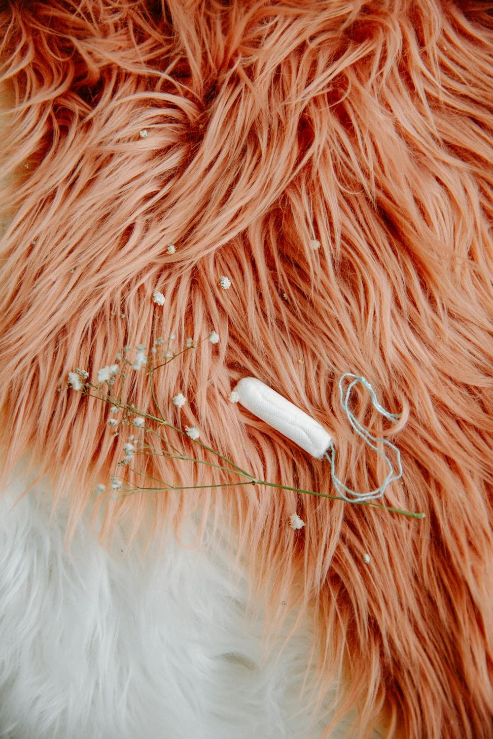 Woman logging cycle data on her iPhone