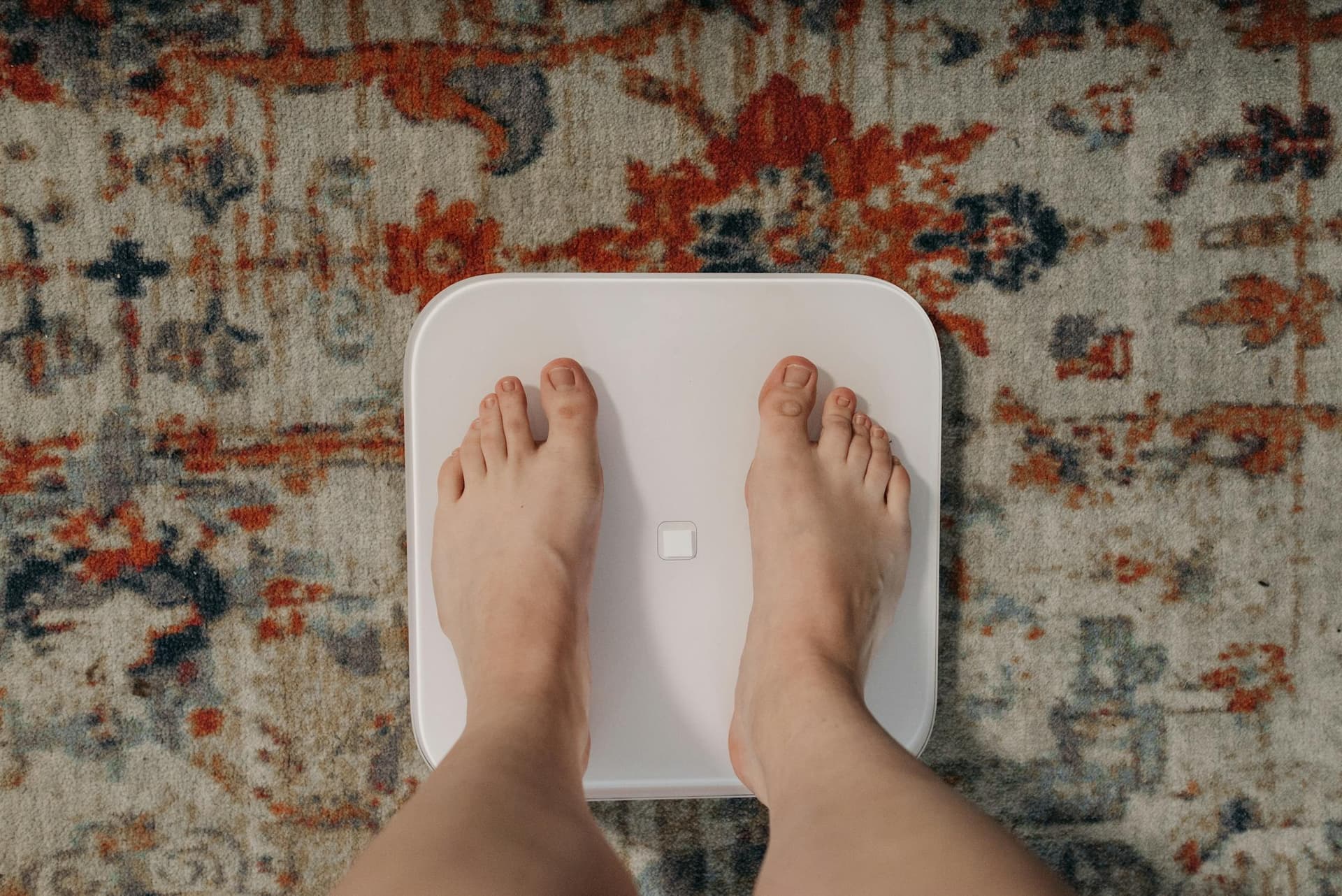 Person standing on a smart scale